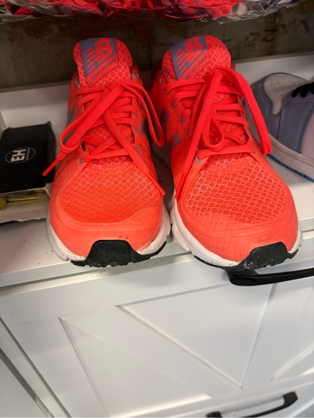 New Balance women’s Bright Neon Orange Lace-Up Sneakers